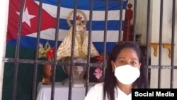 Dama de Blanco Maria Acón Sardiñas asiste a misa este Domingo de Resurrección en La Habana. 