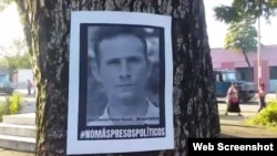 Un afiche con la imagen de José Daniel Ferrer en una calle de Santiago de Cuba pide su libertad y la de todos los presos políticos. (UNPACU)