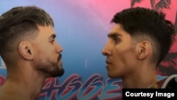 Los pugilistas Robeisy Ramírez y Rafael "Divino" Espinoza.