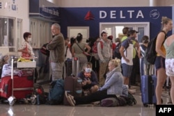 FOTO ARCHIVO. El mostrador de Delta en el aeropuerto de La Habana, el 23 de marzo de 2020. (Photo by ADALBERTO ROQUE / AFP)