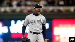 El pitcher cubano Aroldis Chapman (AP Foto/Jim Mone).