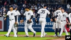 Los Yankees de Nueva York celebran al final de un partido de béisbol contra los Piratas de Pittsburgh, el 29 de septiembre de 2024, en Nueva York. (Foto AP/Eduardo Munoz Alvarez)