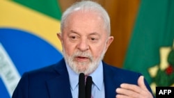 Lula da Silva durante una conferencia de prensa con motivo de la presentación del decreto de Garantía de la Ley y el Orden (GLO) sobre el plan de lucha contra el crimen organizado en Río de Janeiro, en el Palacio Planalto de Brasilia. (Foto de EVARISTO SA / AFP)