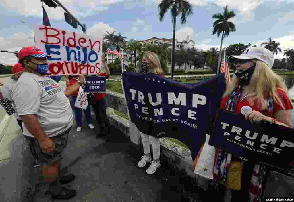 Exiliados muestran su apoyo al presidente Trump durante su visita este viernes a la ciudad del Doral, en el sur de Florida.